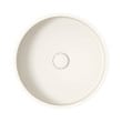 Round white kitchen sink with central drain hole for modern kitchen design.